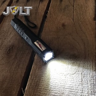 This high powered stun flashlight features grab guard stun strips, a bright XPE LED flashlight with multiple light modes, unique anti-roll design, is rechargeable, and includes a wrist strap and holster.