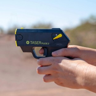 Features laser assisted targeting, iron sights, 15 ft. range, 30 second energy burst, bright LED flashlight, and 2 firing cartridges.